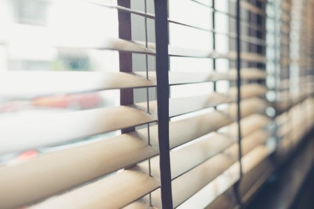 Helping you choose between real faux wood blinds