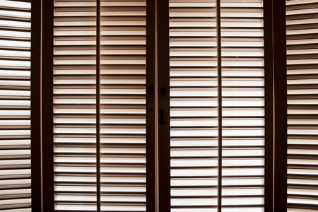 Window shutters choosing real wood and faux wood