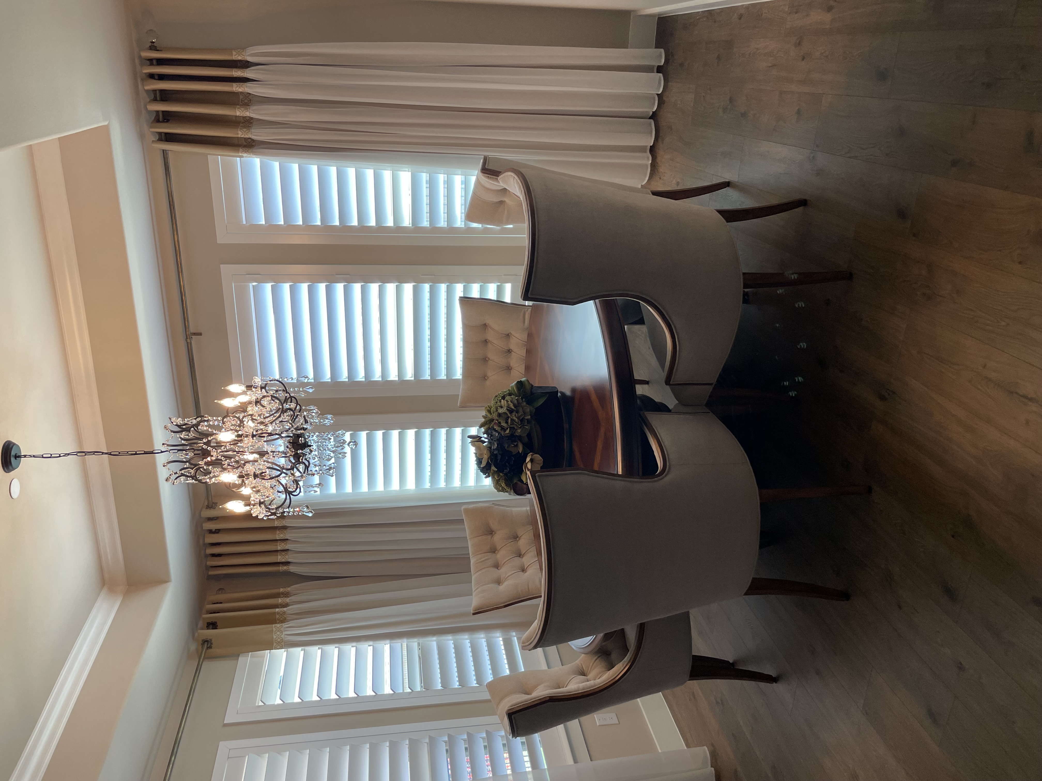 dining room white white shutter windows